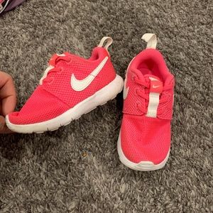 Bright pink nike sneakers